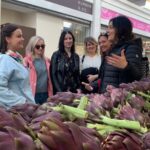 Rome: Street Food, Local Market and Hidden Gems Tour - Crossing the Ponte Testaccio and Learning About Roman Development