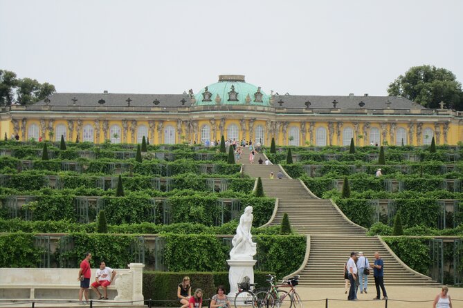 Sanssouci Park: A Self-Guide Audio Tour of the Garden's Landmarks - Exploring the Neptune Grotto and the Great Fountain