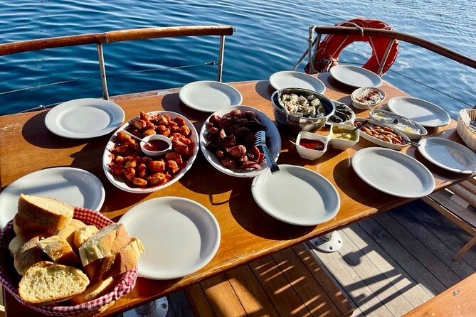 Santorini Caldera Day Traditional Cruise with Meal and Drinks - Santorini’s Iconic Caldera from a Traditional Sailboat