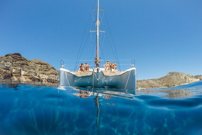 Santorini Catamaran Cruise with Fresh Meal and Open Bar - Visiting the Iconic Red Beach and White Beach by Sea