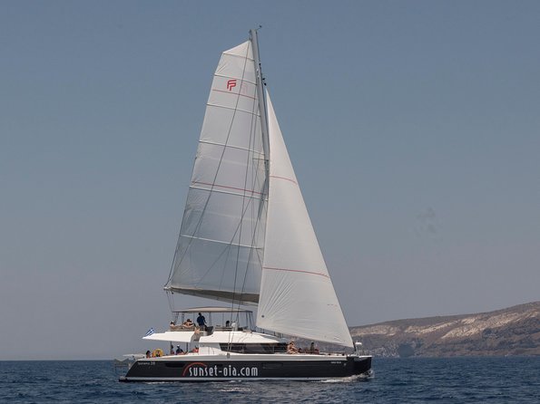 Santorini Luxury Catamaran Day Cruise with BBQ,drinks,transfer - Exploring Santorini’s Coastline from the Water