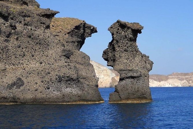 Santorini Luxury Private Cruise with Hotel & Cruise Port Pickup - Exploring the Iconic Stops: Red Beach and White Beach