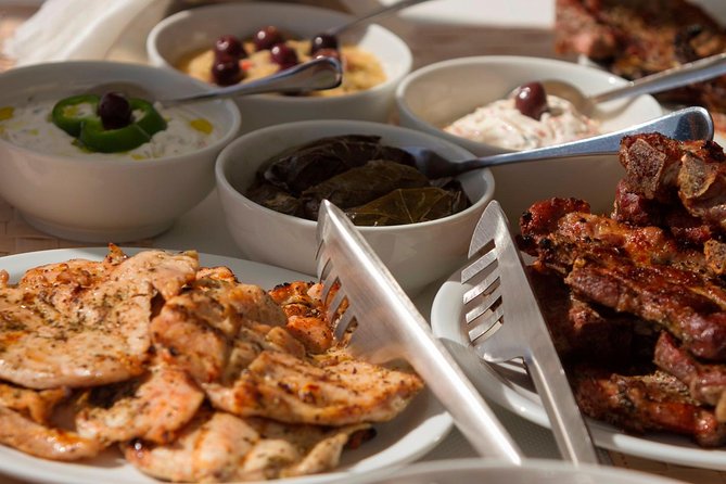 Santorini Luxury Sailing Catamaran Cruise with BBQ, Drinks and Transfer - Enjoying Greek Cuisine and Open Bar on Deck