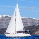 Santorini Private Daytime Sailing Tour with Meal, Drinks &Transfer included - From Vlychada to the Red and White Beaches