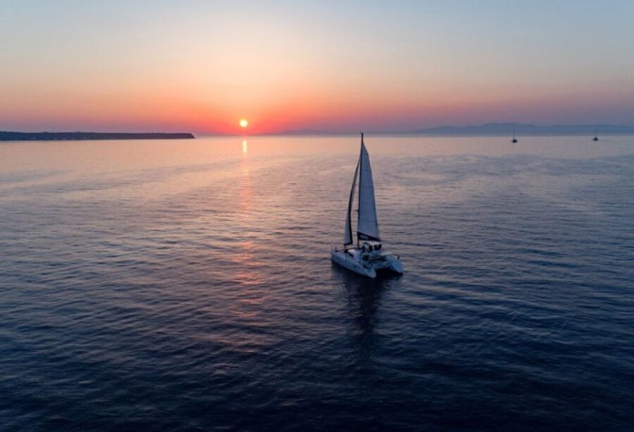 Santorini: Private Sunset Cruise with Dinner and Drinks - Departure from Vlychada Beach and the Scenic Start
