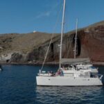 Santorini: Sunset Cruise with Greek Dinner and Transfer - From Hotel Pickup to Scenic Departure from Multiple Locations