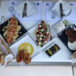 Santorini Sunset Luxury Sailing Catamaran Cruise with BBQ, drinks, transfer - Exploring Santorini’s Iconic Beaches: Red Beach and White Beach