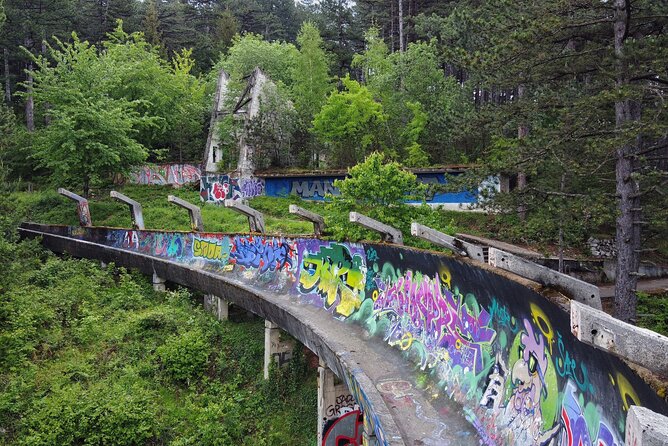 Sarajevo: A City Under Siege - War Tour With Tunnel Museum - Walking Through Sniper Alley: A Dangerous Chapter