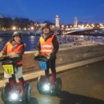 Segway by night ! Illuminated Paris - Learning Safety and Riding Techniques with Certified Guides