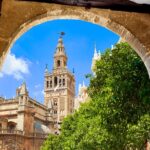 Seville: Cathedral & Giralda Guided Tour with Tickets - Climbing the Giralda Tower for City Views