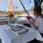Seville: Exclusive River Boat Tour with Tapas - Exploring the Guadalquivir River Route