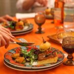 share a traditional meal with licauw - Inside the Garden and Indoor Dining Options