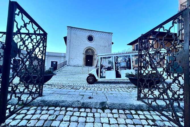 Sightseeing Tour of L'Aquila aboard an Electric Shuttle - Visiting the Basilica di Santa Maria di Collemaggio and Holy Door