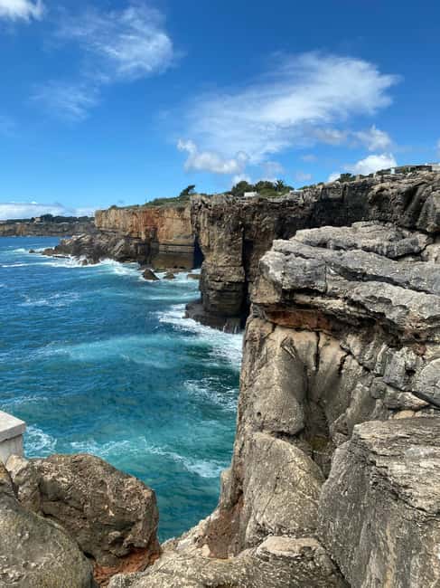 Sintra & Cascais: Tour With Portuguese Souvenir Shopping - Exploring Pena Palace: Portugal’s Romantic Icon