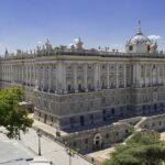 Skip-the-line Madrid Royal Palace with tapas tasting & Retiro Park - The Plaza de Isabel II and the Royal Palace Exterior