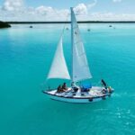 Slow Sailing Bacalar - 3-hours of Nature and crystal waters - Highlights of the Stops: Bird Island, Cenotes, and Pirate’s Channel