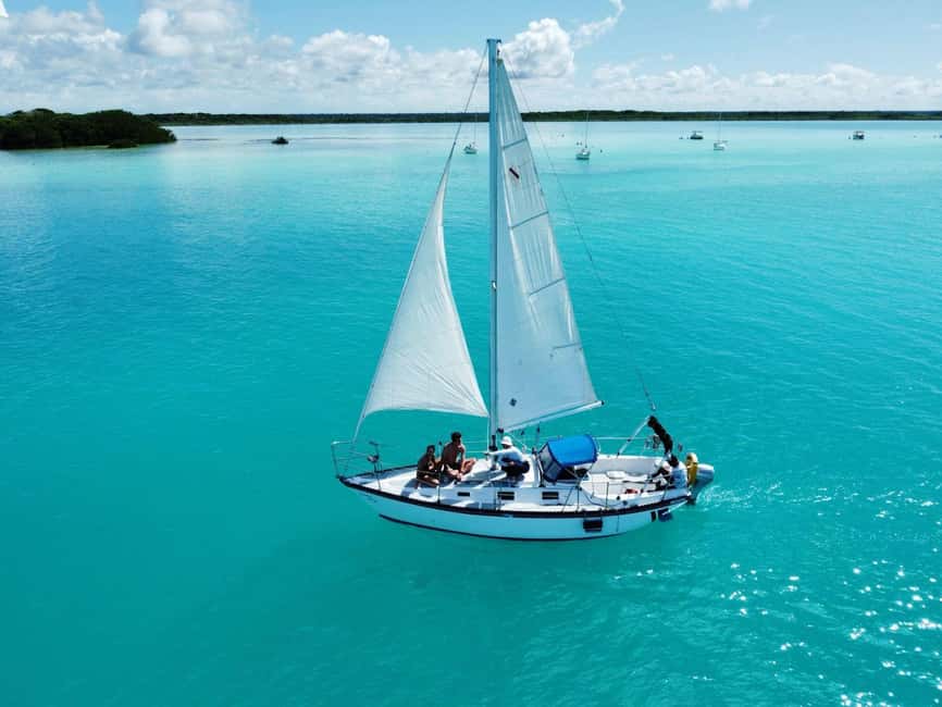 Slow Sailing Bacalar - 3-hours of Nature and crystal waters - Highlights of the Stops: Bird Island, Cenotes, and Pirate’s Channel