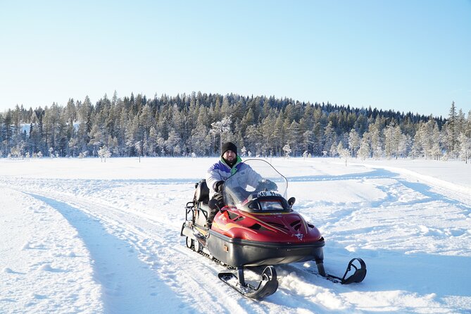 Snowmobile tour - Exploring the Scenic Vistträsk By and the Highest Point