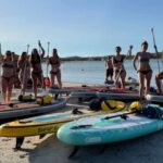 Spiaggia delle vacche SUP paddleboard tour sunset aperitif - Starting at Cala Girgolu with a Safety and Instruction Briefing