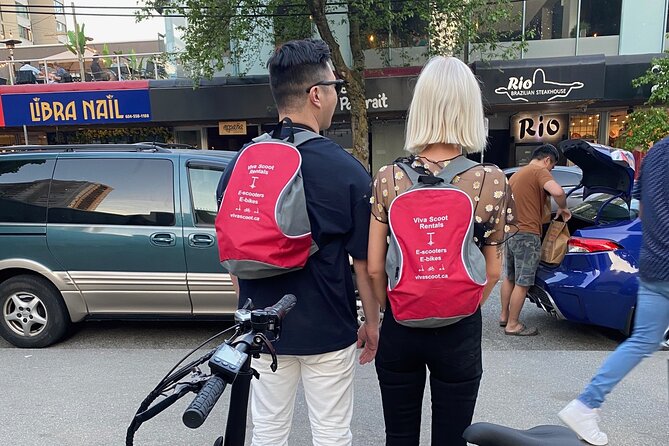 Stanley Park Seawall E-scooter Rental with Self Guided map - Exploring the A-maze-ing Laughter Sculptures