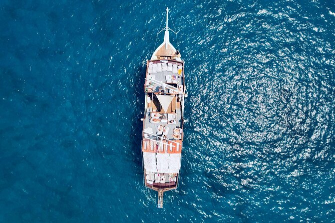 Sun & Sea 6 Hour All Inclusive Swimming Cruise with Greek BBQ & Unlimited Drinks - Starting at Mandraki Harbour for a Scenic Departure