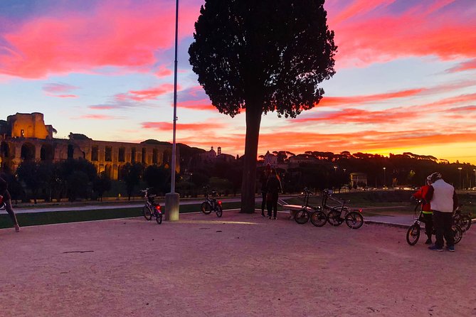 Sunrise in Rome: Small-Group E-Bike tour with Italian Breakfast - Riding an E-Bike Through Rome’s Historic Streets