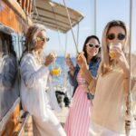 Sunset Dinner Cruise: Swim Stop, Drinks & Onboard Dining - Passing Iconic Landmarks and the Sunset View