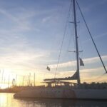 Sunset in Valencia from the Catamaran Mundo Marino - The Itinerary: From the Marina to the Mountain Backdrop