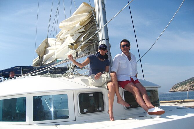 Sunset on a catamaran: from Es Vedrá to Cala Conta - Starting Point: Cala dHort for Sunset Viewing and Departure