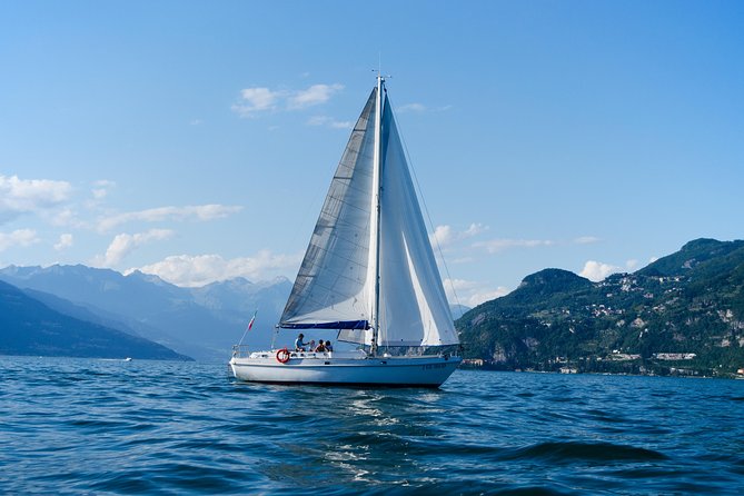 Sunset sailing on lake Como with Private Skipper - The Scenic Route and Toplandmarks