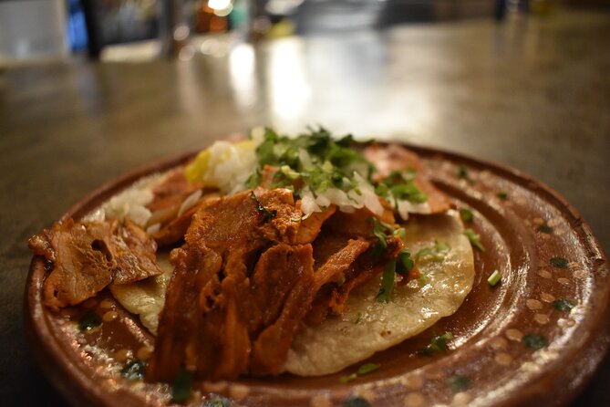 Tequila and Tacos Sunset Bike Tour - Tasting Seafood Jalapeno Tacos at Mariscos Cisneros