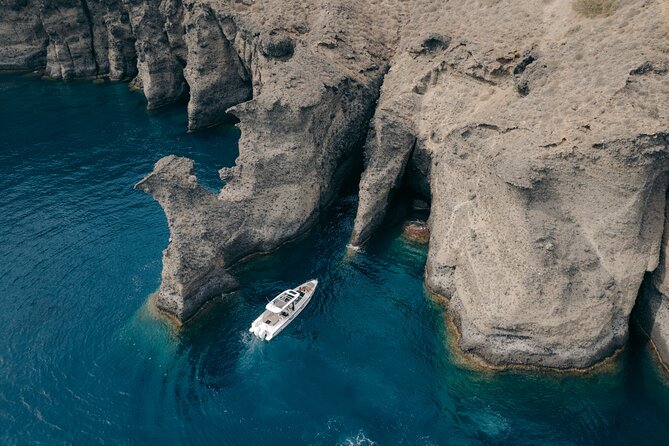 The Fastest Private Motor Yacht in Santorini - All Inclusive Tour - Mesa Pigadia Beach: Clear Waters for Swimming and Snorkeling
