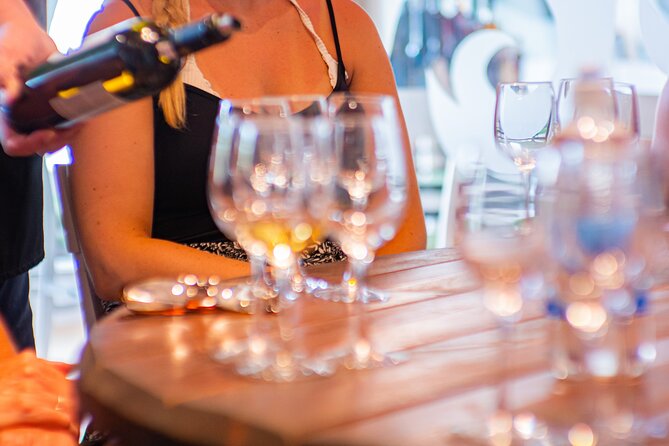 Top Sights of Santorini with Wine Tasting and Sunset in Oia - Relaxing at Perissa Black Sand Beach: Swimming and Lunch Time