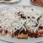 Traditional cuisine in a home restaurant in Syracuse - The Skill and Passion of Chef Maria Rita