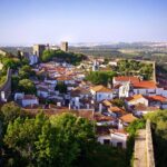 Transfer Tour Lisbon/Porto with 2 stops options Óbidos, Nazaré, Fátima, Coimbra - Starting Point and Duration of the Journey