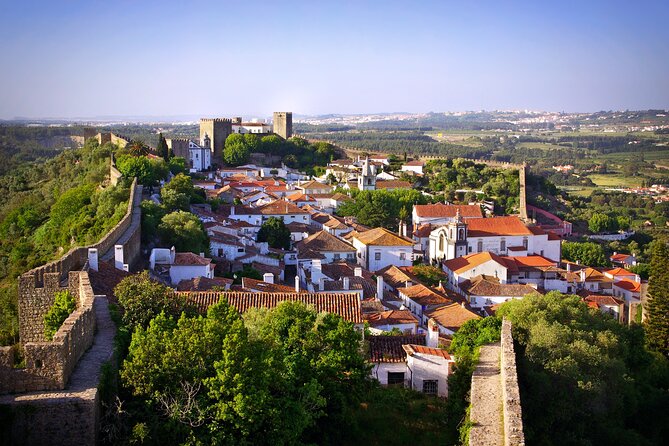 Transfer Tour Lisbon/Porto with 2 stops options Óbidos, Nazaré, Fátima, Coimbra - Starting Point and Duration of the Journey