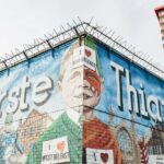 Troubles Tour Belfast: Walls & Bridges Guided Walking Tour - Exploring Belfast City Hall and Surroundings