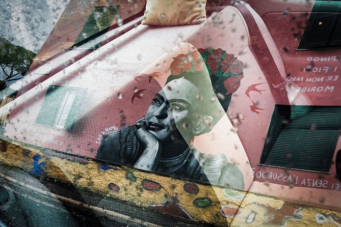 Trullo Photo Tour: popular art and poetry on the walls of a neighborhood - Starting Point: Mercato del Trullo in Rome