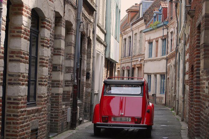 Unique Tour of Lille by Convertible 2CV - 1h00 - Visiting Place Rihour and Lille’s Royal Palace