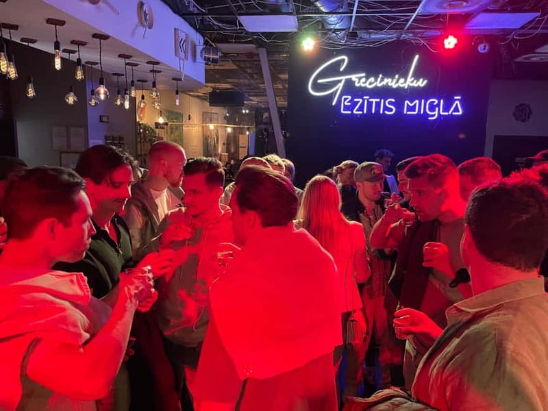 Vilnius: Pub Crawl with Welcome Drink and Traditional Snacks - Vilniuss Nightlife Begins with a Welcome Drink