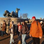 Walk & Ferry: Copenhagen Highlights + Change of Guards Finale - Admiring Glyptoteket’s Grand Façade and Tropical Garden