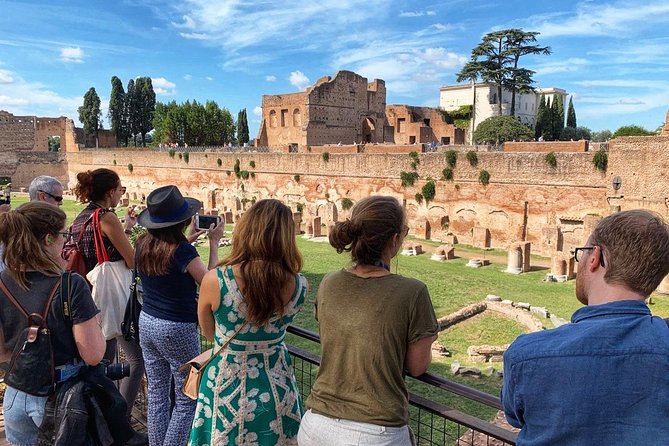 Walking Tour at The Colosseum and Forum with an Archaeologist - Visiting the Colosseum: Secrets of the Ancient Amphitheater
