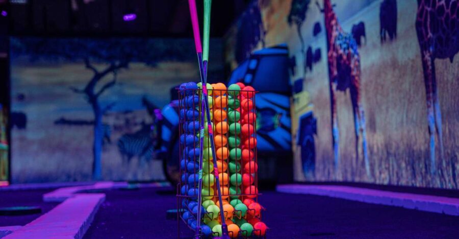 Woop! Glow golf: Ljubljana Btc City - Neon Journey Through Four Distinct World Themes