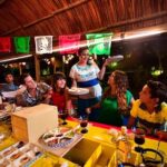 Xoximilco Party Night over Trajinera - Departure from Cancun - The Festive Start at Xoximilco Cancun by Xcaret