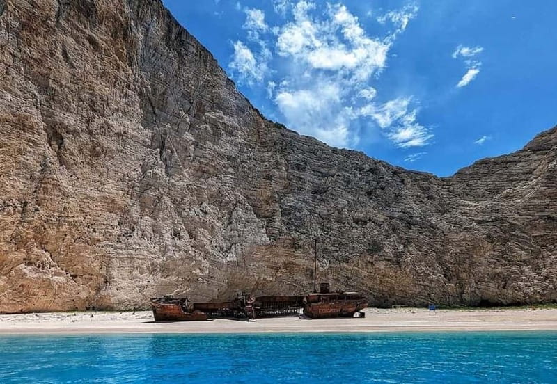 Zakynthos: Blue Caves and Navagio Bay Swim Cruise - Exploring the Scenic Agios Andreas Bay and Its Crystal Waters