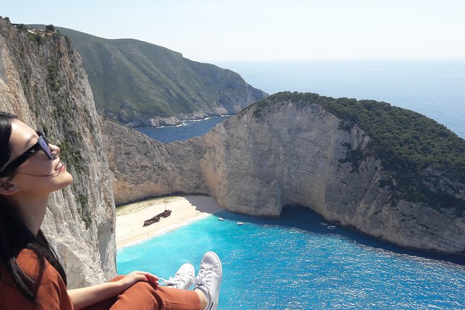 Zakynthos : One day small group tour to Navagio beach Blue Caves & top view - Discovering the Blue Caves in a Glass-Bottom Boat