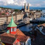 Zurich Highlights In A 2+ Hour Walking Tour Including Panoramic Views - Visiting Iconic St. Peter’s Church and Its Unique Features