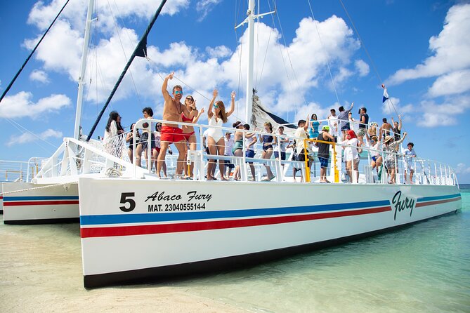 Catamaran Fury Cozumel Snorkel, Lunch and Beach Club **Official** - Exploring Playa El Cielo: Swimming in Crystal Waters