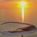 St. Pete Dolphin Watching and Island Sunset Cruise - Passing the Gulf Port Community and Historic Waterfront